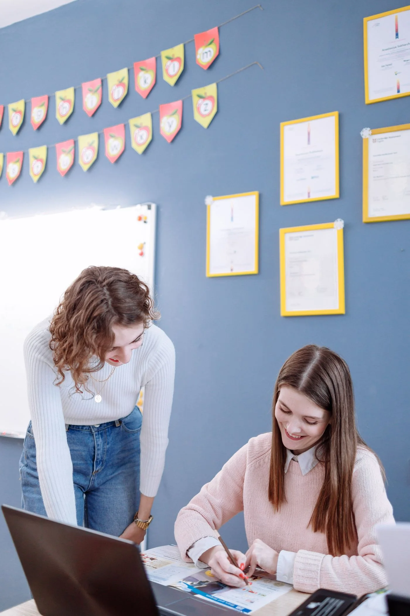 Tutor helping a student with homework